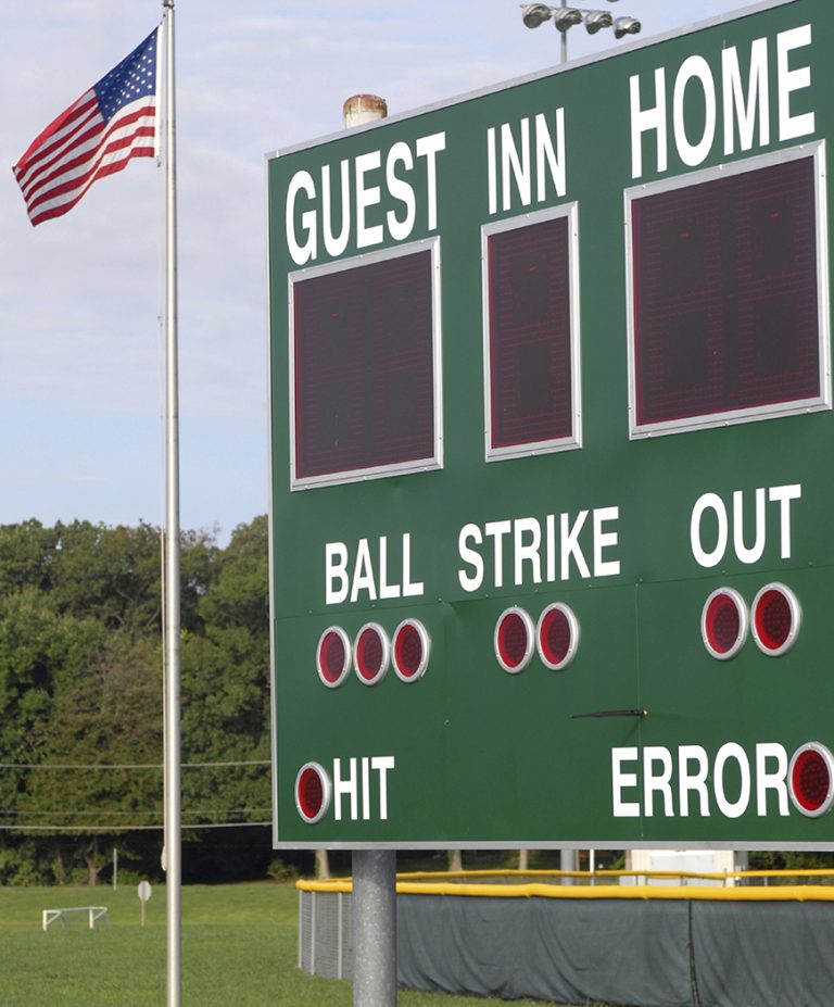 A score board on a baseball/softball field.